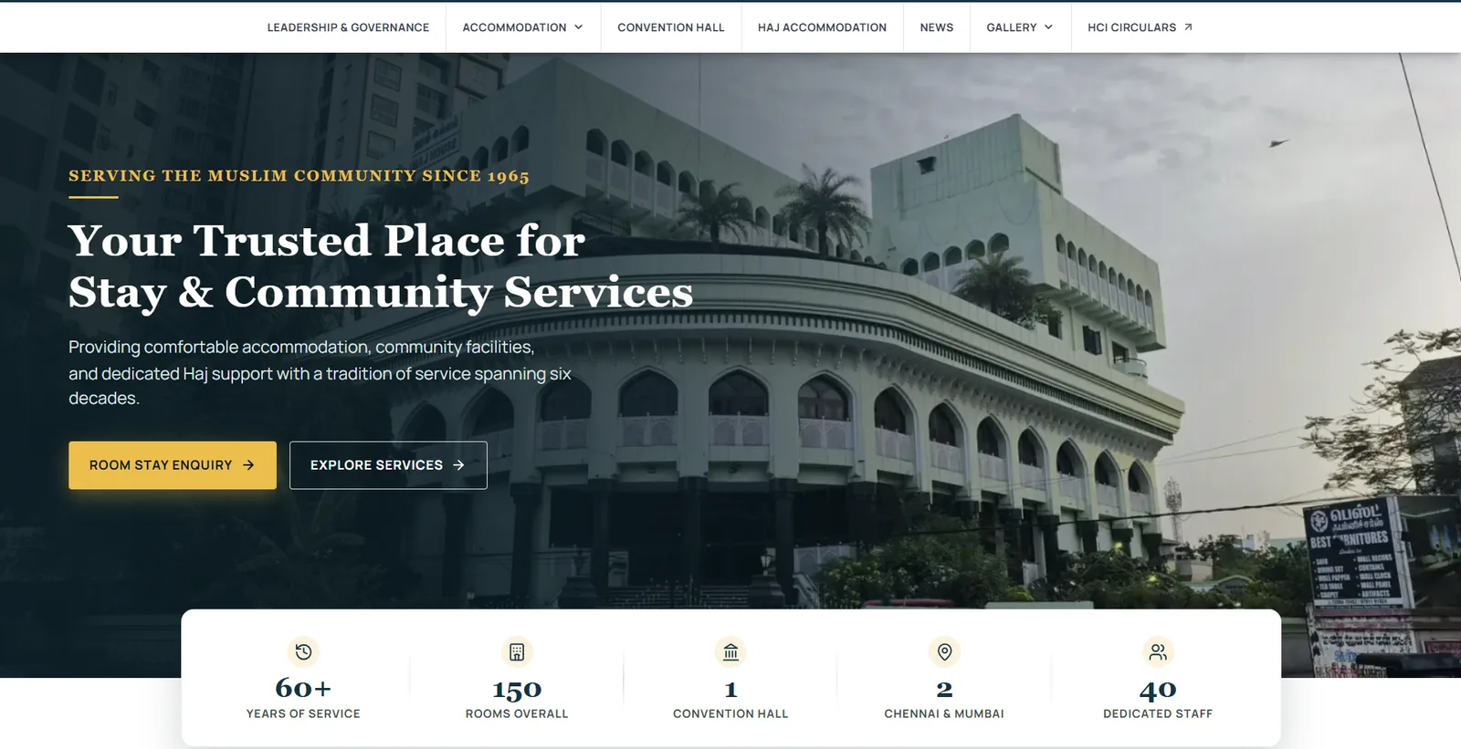 The public home page of an institutional guest house, opening on the building itself with years of service and room counts beneath it.